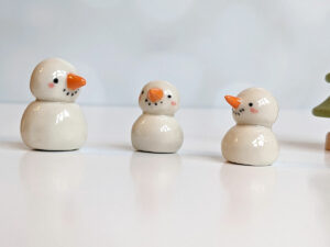 porcelain snow people