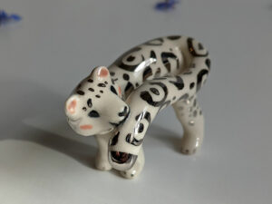 porcelain figurine snow leopard tail white gold