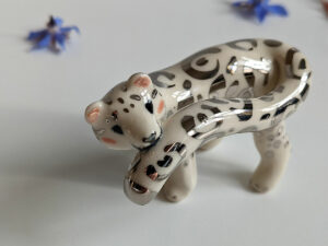 porcelain figurine snow leopard tail white gold