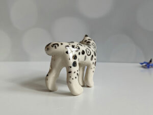 porcelain figurine snow leopard tail white gold