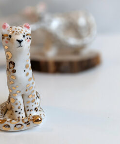 porcelain figurine snow leopard gold