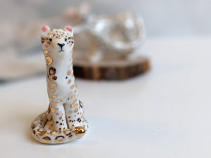 porcelain figurine snow leopard gold