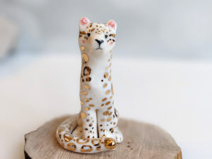 porcelain figurine snow leopard gold