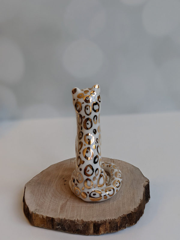 porcelain figurine snow leopard gold