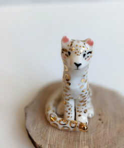 porcelain figurine snow leopard gold
