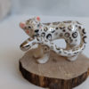 porcelain figurine snow leopard tail white gold