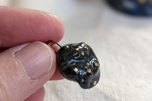 gemini armadillo pendant porcelain gold