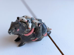 woodchuck opossums babies figurine