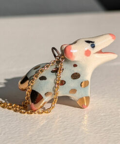 screaming opossum pendant