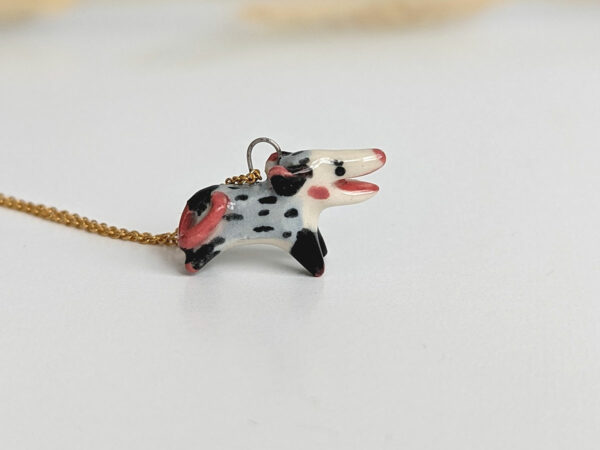 screaming opossum pendant porcelain