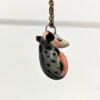 adorable sleeping opossum pendant in porcelain