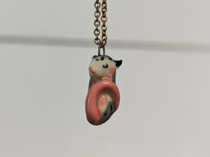 adorable sleeping opossum pendant in porcelain