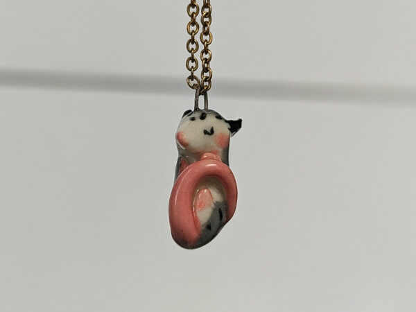 adorable sleeping opossum pendant in porcelain