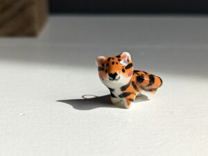 cute handmade porcelain tiger pendant by kness
