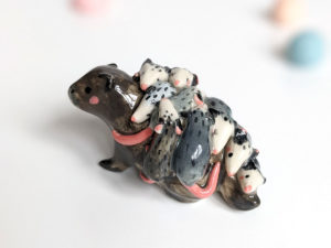 woodchuck opossums babies figurine