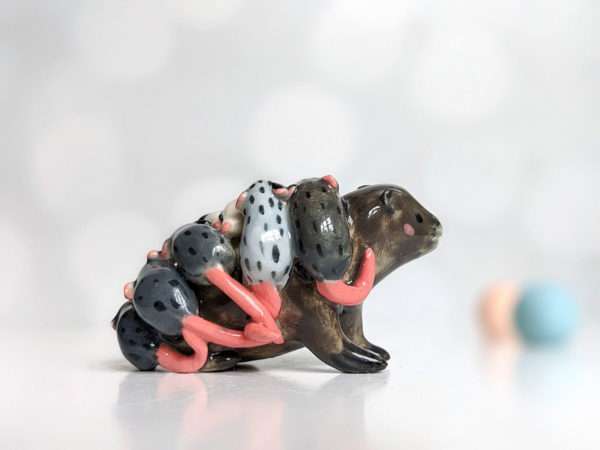 woodchuck opossums babies figurine