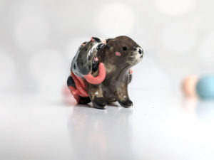 woodchuck opossums babies figurine