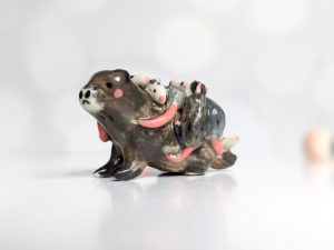 woodchuck opossums babies figurine