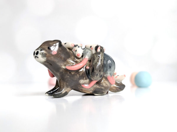 woodchuck opossums babies figurine