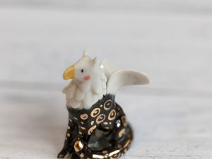 porcelain gryphin gold