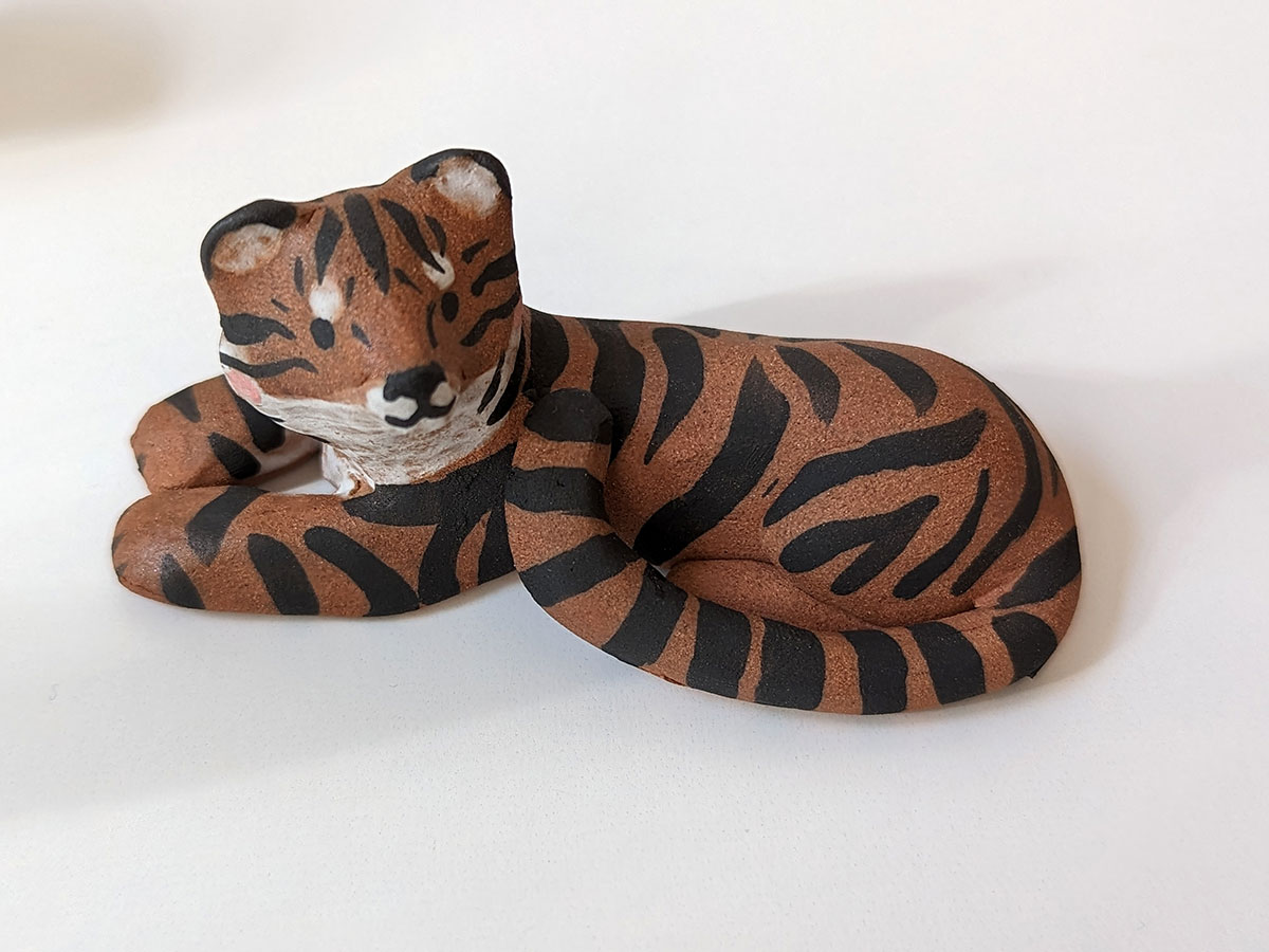 red clay matte tiger figurine