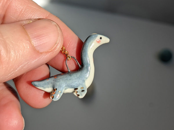 plesiosaur pendant grey gold