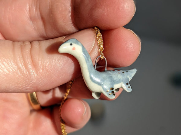 plesiosaur pendant grey gold