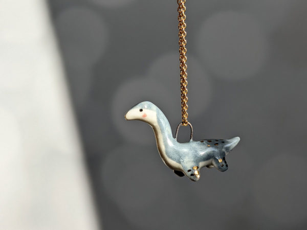 plesiosaur pendant grey gold