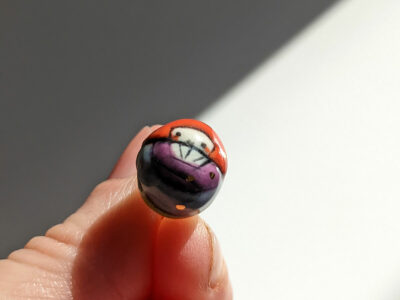 pride rainbow isopod pendant porcelain