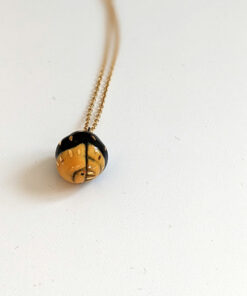 rubber duckie isopod pendant porcelain