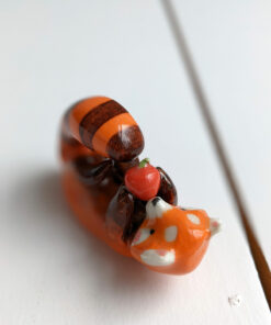 red panda and apple figurine
