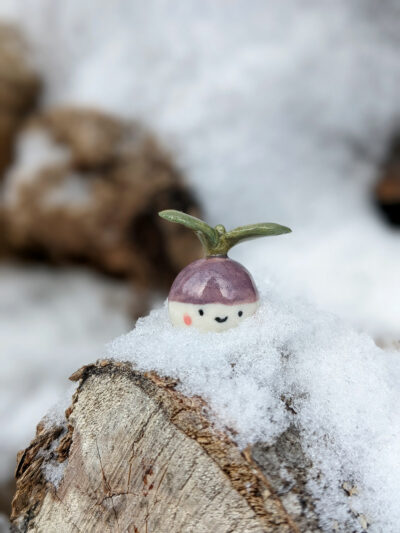 sprint seedling porcelain figurine