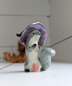 porcelain witch squirrel figurine