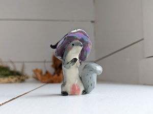 porcelain witch squirrel figurine