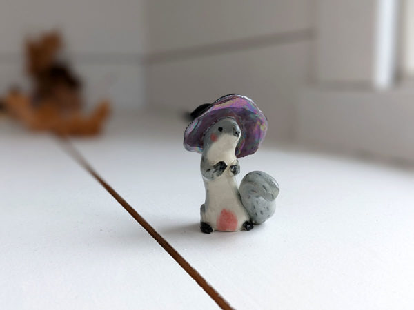 porcelain witch squirrel figurine
