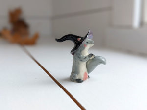 porcelain witch squirrel figurine