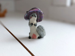 porcelain witch squirrel figurine