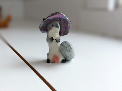 porcelain witch squirrel figurine