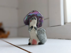 porcelain witch squirrel figurine