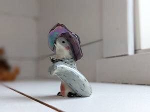 porcelain witch squirrel figurine