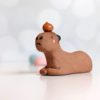 red clay capybara orange figurine