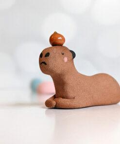 red clay capybara orange figurine