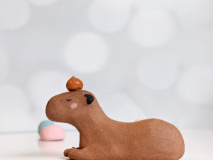 red clay capybara orange figurine