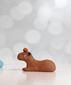 red clay capybara orange figurine