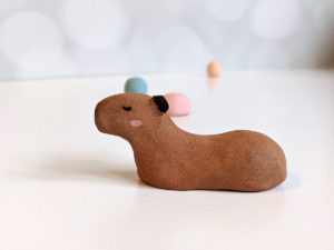 red clay capybara figurine