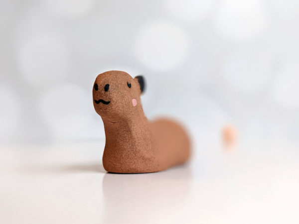 red clay capybara figurine