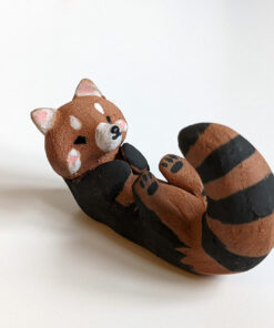 red clay ceramics figurine red panda holder