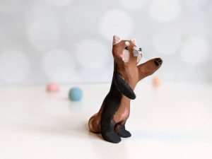 red panda red clay ceramics figurine