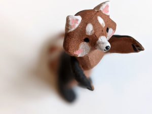 red panda red clay ceramics figurine