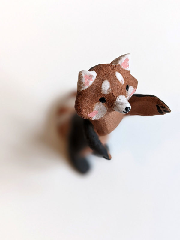 red panda red clay ceramics figurine